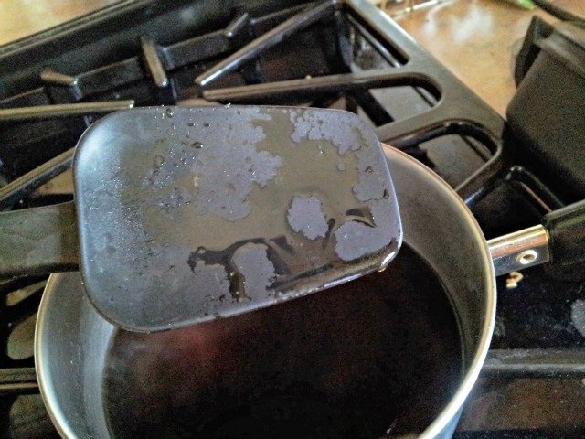 Simple syrup dripping off a spatula.