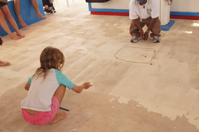 Playing the dice game aboard the catamaran