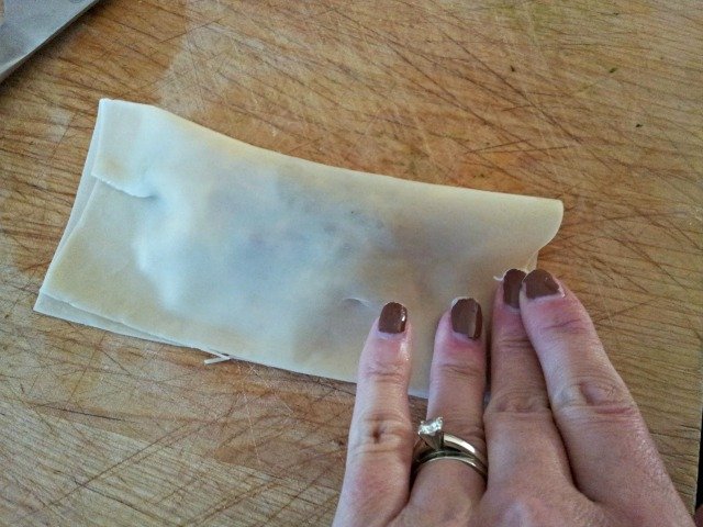 Seal empanada working from the center out to the edges