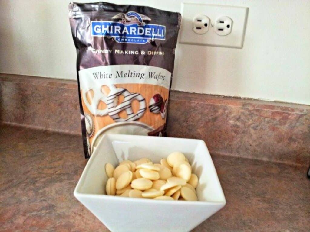 Image shows ready to melt white chocolates.