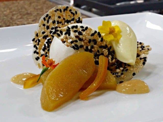 Caramel poached apples with saffron ice cream and yogurt mousse