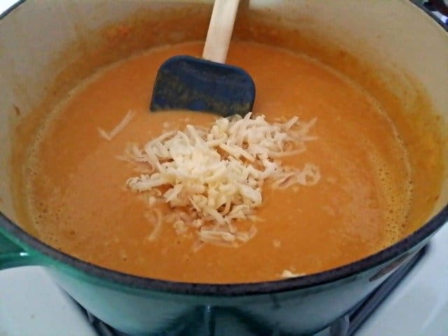 Don't add too much cheese at once or it won't melt right