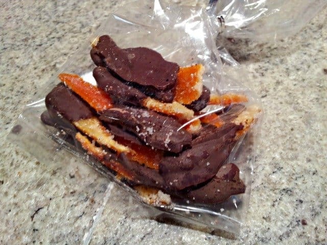 Chocolate dipped candied orange peels in bag