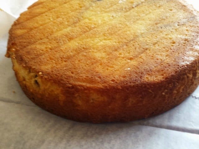 Before frosting cake, line your plate with parchment paper and even off the top