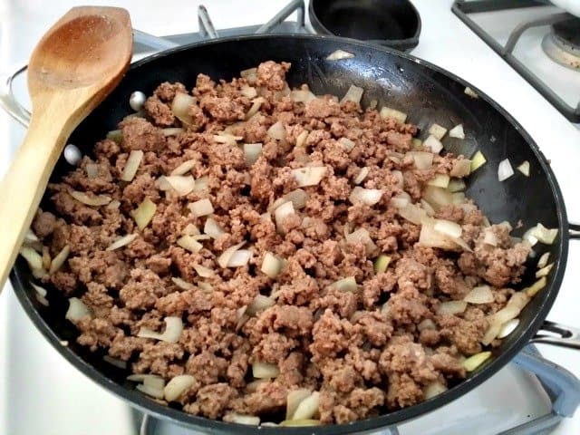 Fully browned ground beef is ready to be mixed with tomatoes