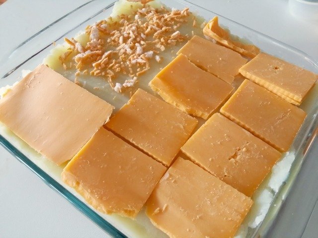 Top Shepherd's Pie with cheese, and it's ready to bake