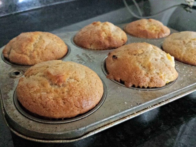 Perfectly baked peach kuchen muffins