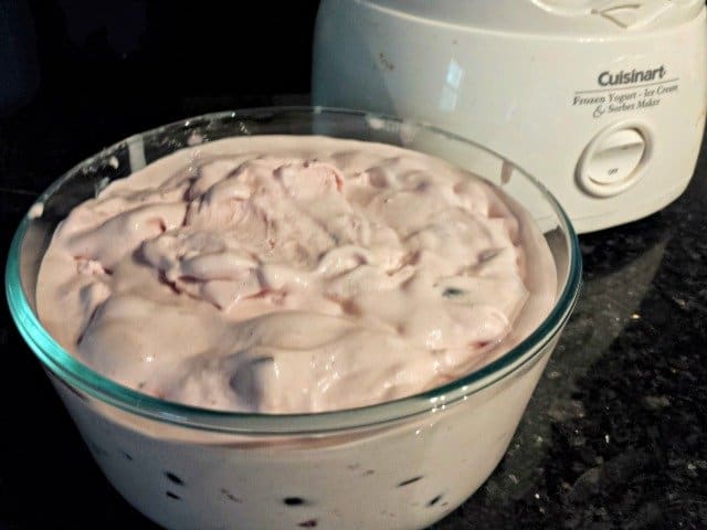Add ice cream to a sealable container to freeze once it is processed