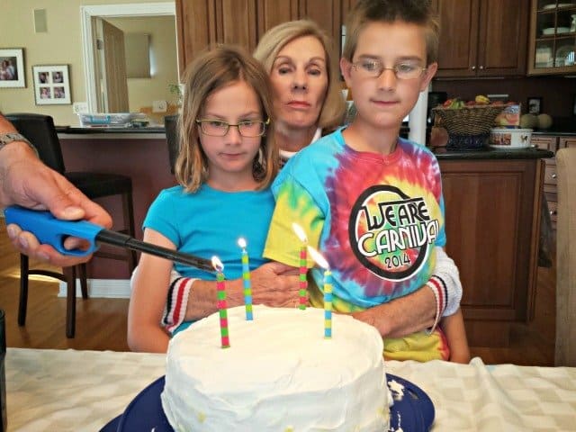 Blowing out the candles for 70th birthday