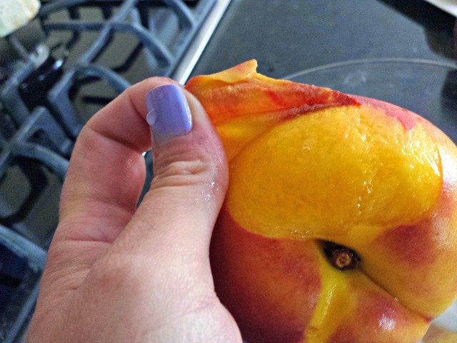 Easily peel the skin off your peach by hand