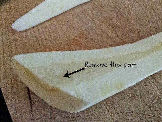 Cut around the woody part of the parsnip