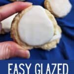 Hand holding a cookie with text easy lemon glazed cookies.