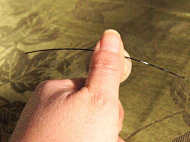 holding the wire in place