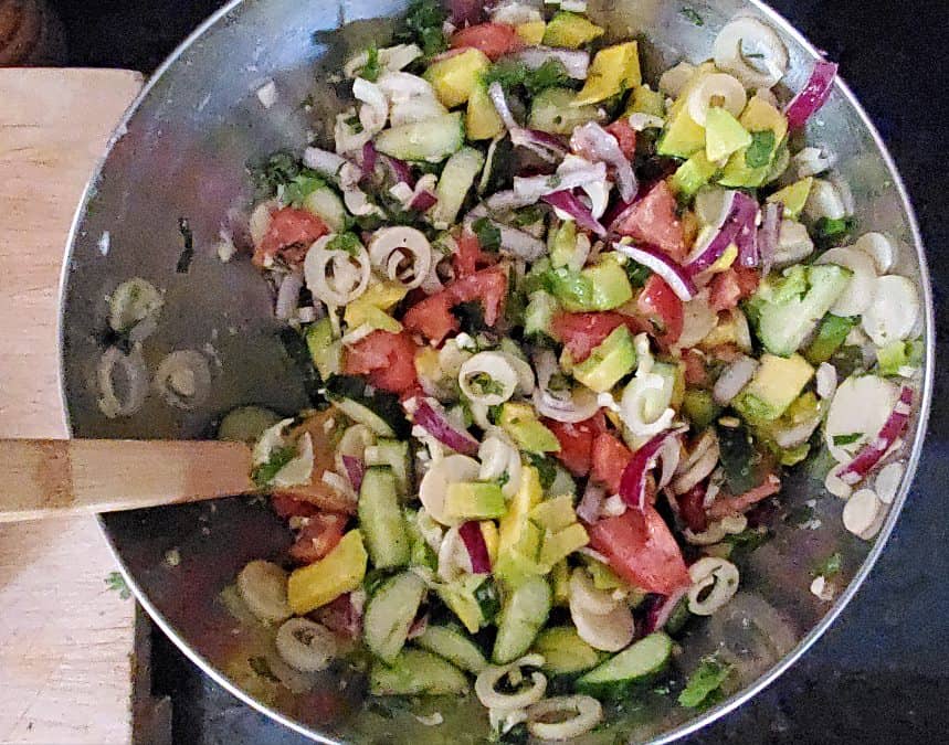 Bowl of just stirred hearts of palm salad