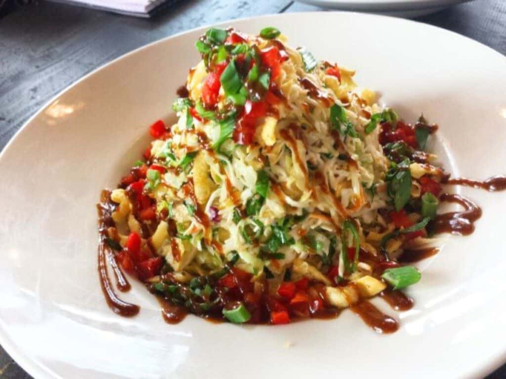Image shows Asian chicken salad.