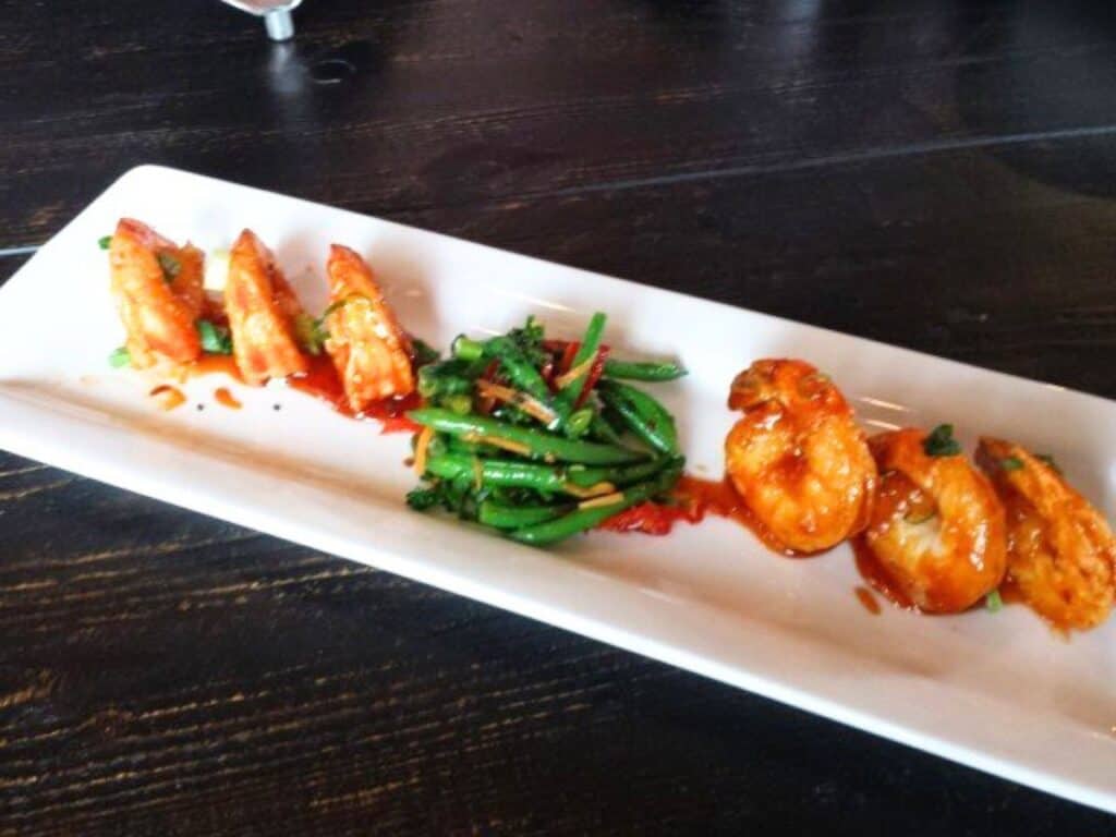 Image shows Asian glazed shrimp.