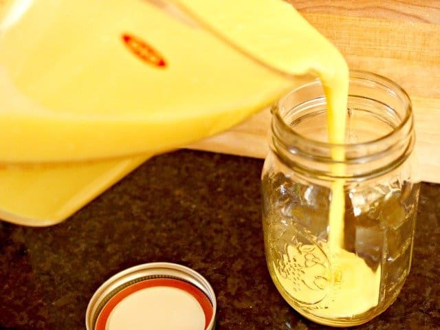 Use a liquid measuring cup to pour pineapple curd