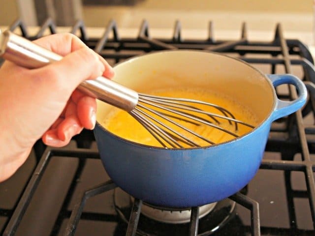 Whisking pineapple curd ingredients