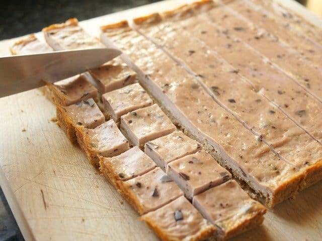 Cut cheesecake into 1 inch cubes