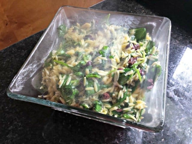 Cover salad to marinate in the fridge