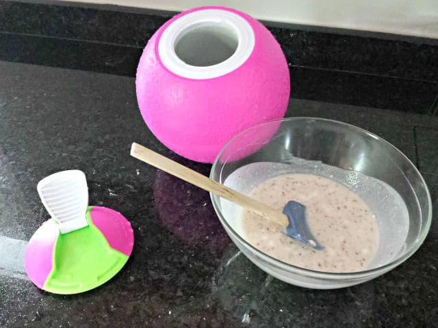 Ready to fill Yay Labs ice cream ball with homemade frozen strawerry yogurt
