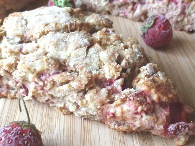 About to eat a strawberry bacon scone