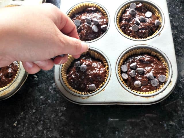 Add chocolate chips to dairy free chocolate chip muffin tops