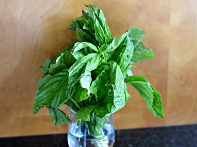 Store basil in a small jar of water