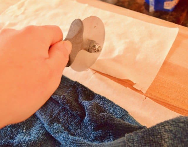 Use a pizza wheel to slice phyllo dough