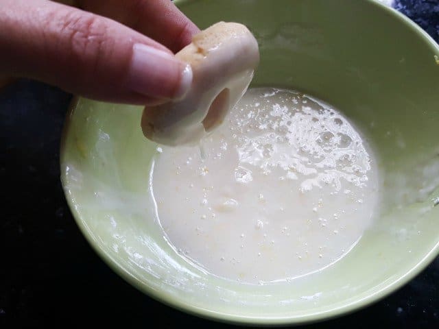 Dip and swirl donuts in the lemon glaze