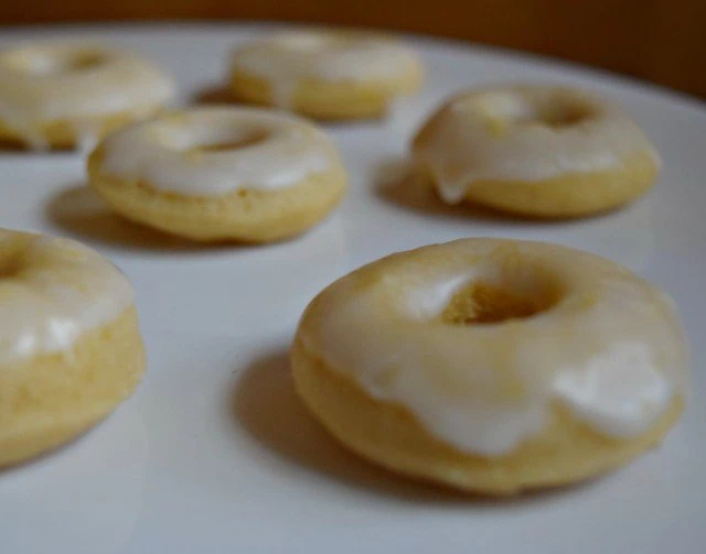Enjoy a plate of lemon glazed donuts