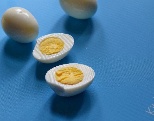 Slice eggs in half for bacon deviled eggs