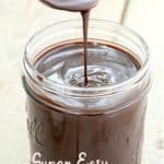 Spoon drizzling hot fudge sauce