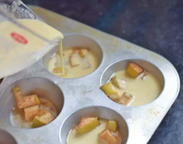 Pour batter into muffin tins using a liquid measuring cup