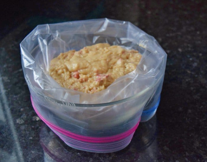 Use a bowl to hold zip top bag to fill before piping
