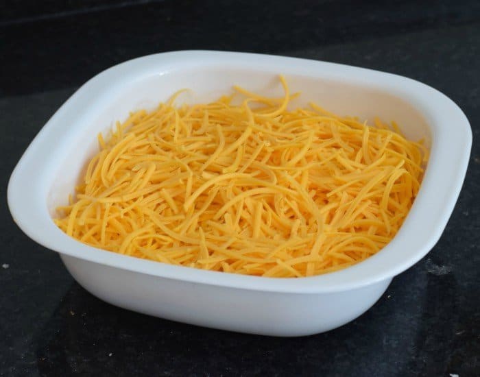 Add a good layer of cheddar over the smoky cheesy chicken enchilada dip