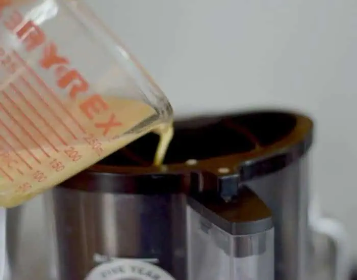 Add liquids through the food processor chute