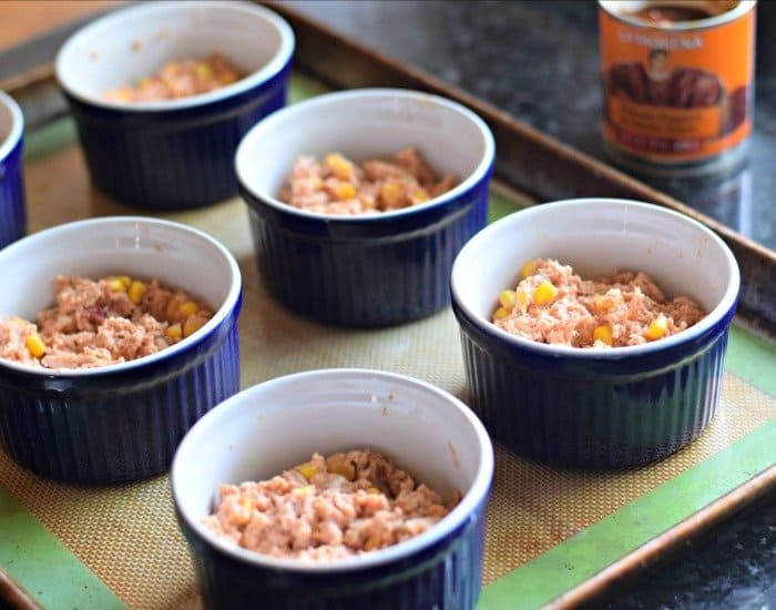 Add tamale filling to ramekins