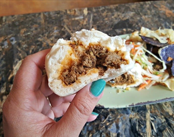 Inside the cheeseburger pod at Santuli Canteen bao buns Disney quick serve restaurant