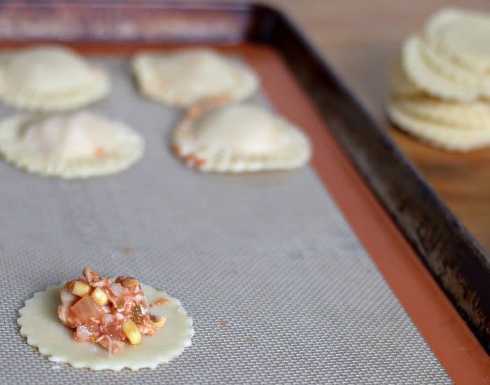 Place a teaspoon of filling on the pie crust round