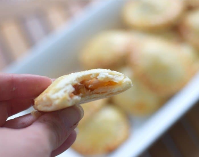 Try bite of easy chicken empanada