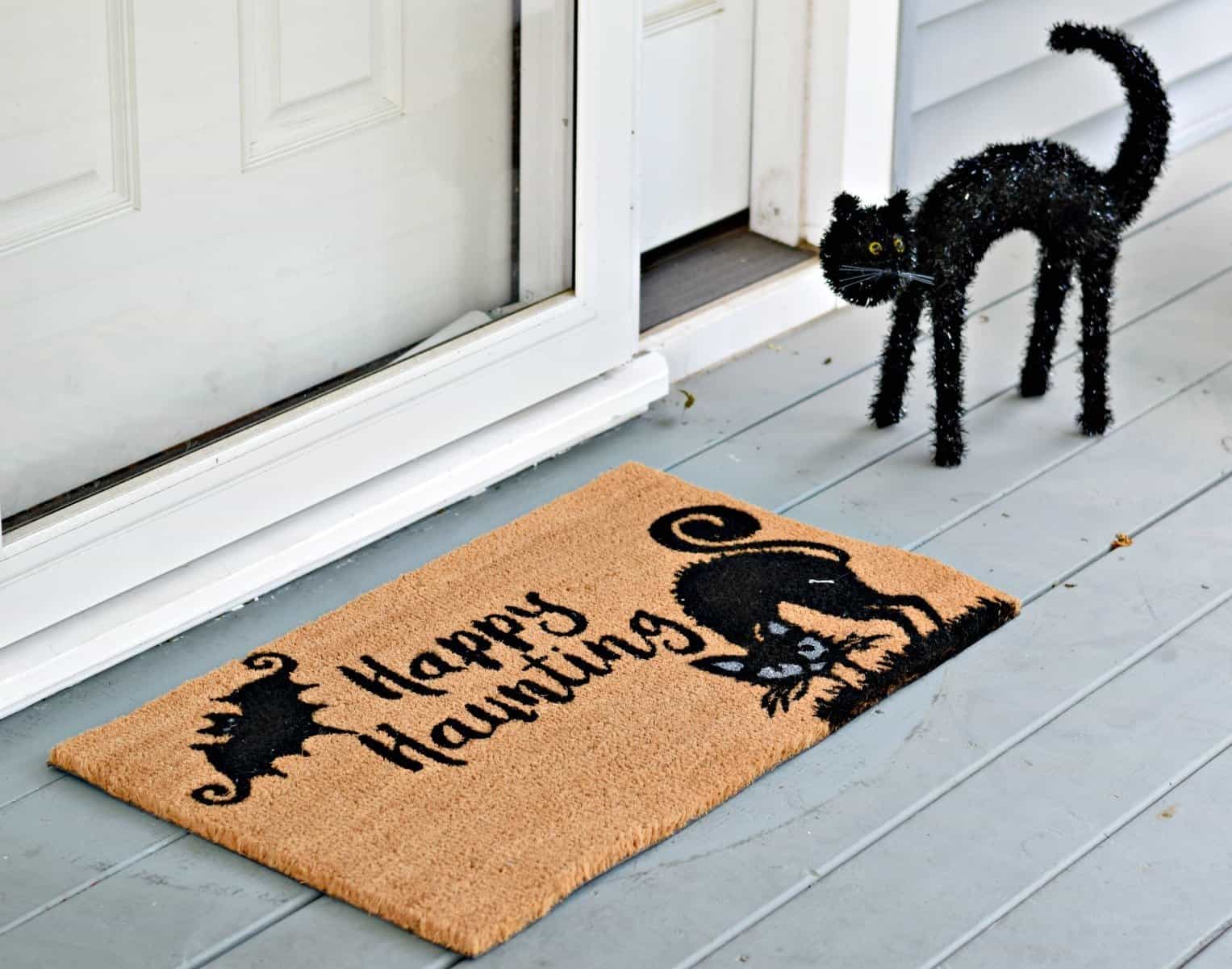 Halloween front porch statue and matching welcome mat