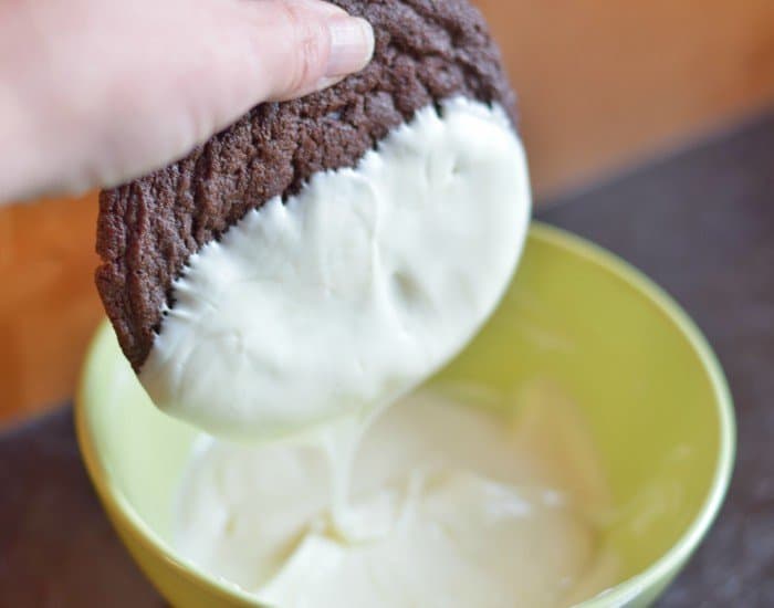 Dip cookie in white chocolate