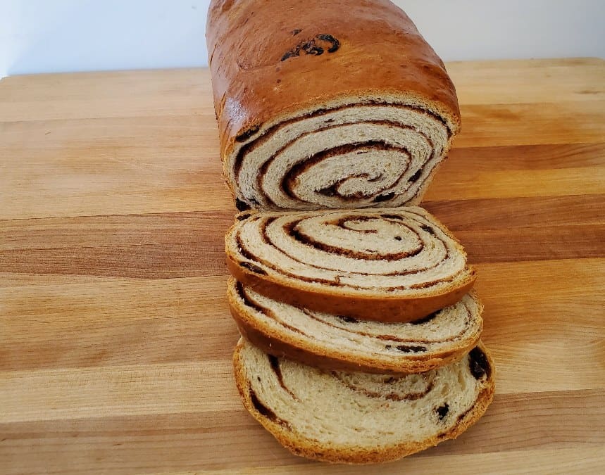 Slices of a cinnamon raisin bread loaf