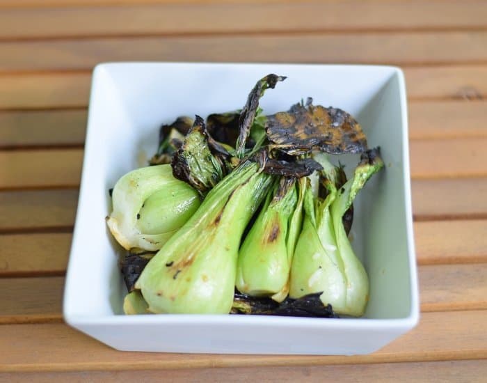 Bowl of grilled baby bok choy