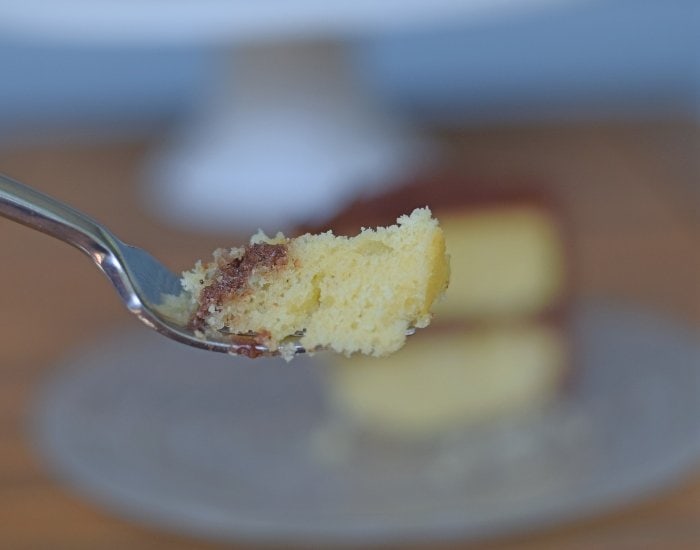 Bite of homemade yellow cake