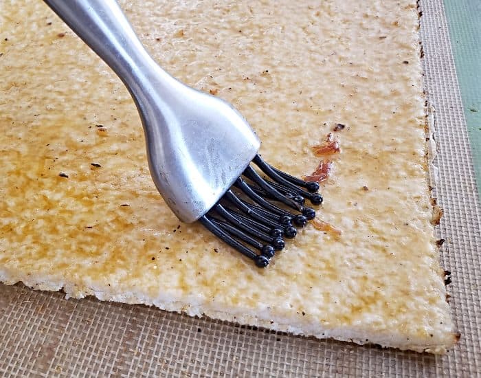Brush crust with oil