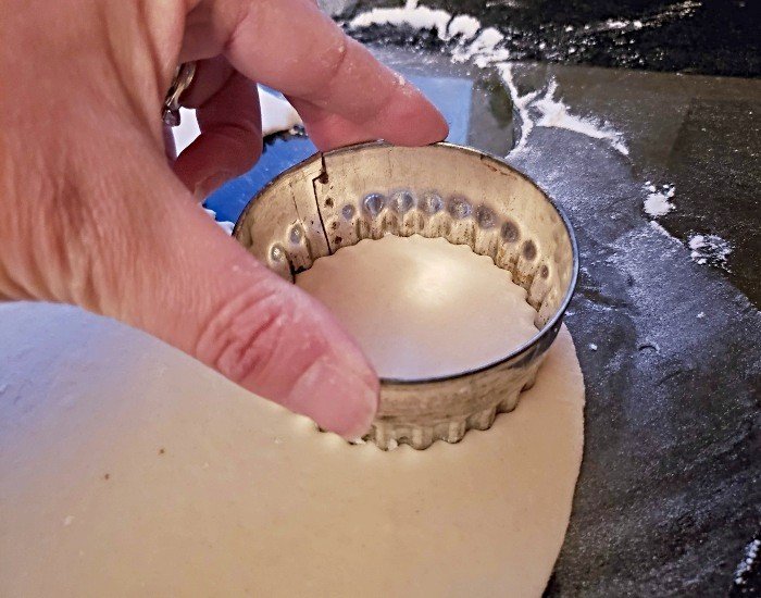 Cut rounds from dough