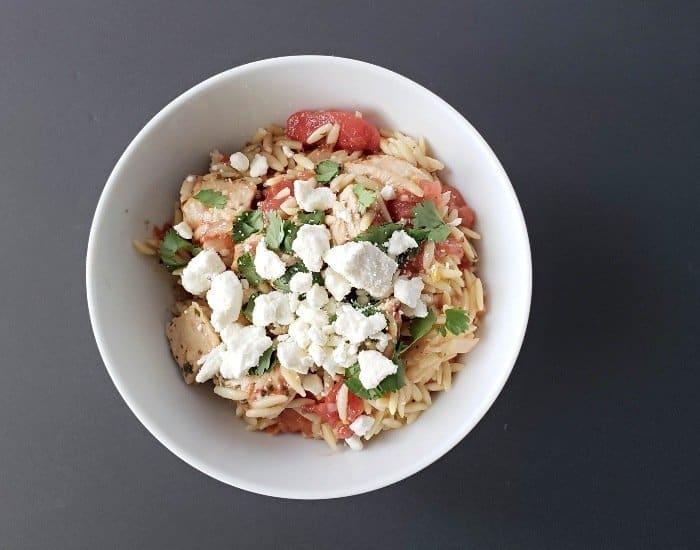 Image shows an overhead shot of Image shows in a white bowl and a black background.