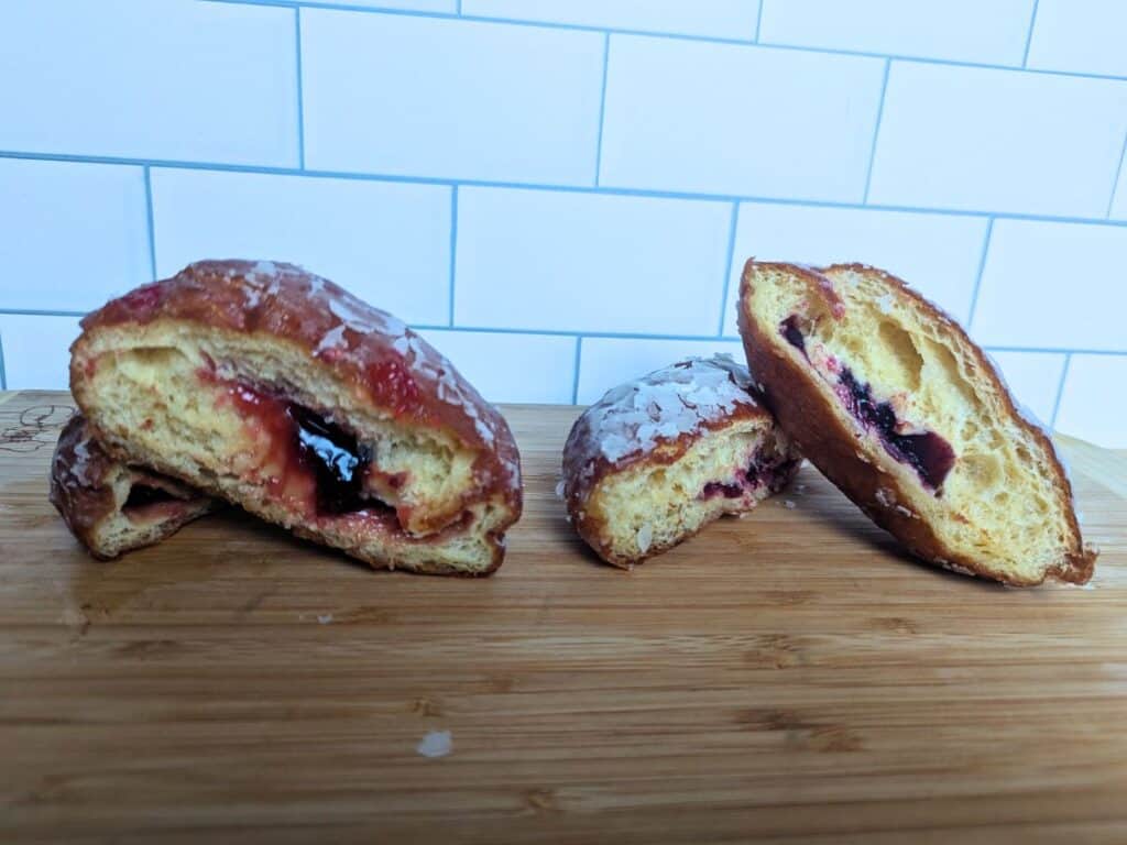 Image shows two paczki flavors from Barankowski Deli and Bakery in Franklink Park.